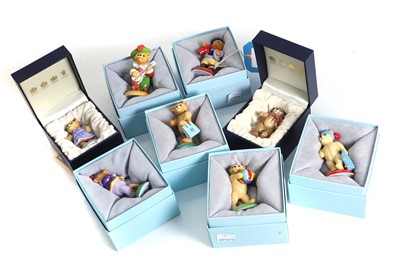 Lot 107 - A collection of Halcyon Days enamel Teddy of the Year figures