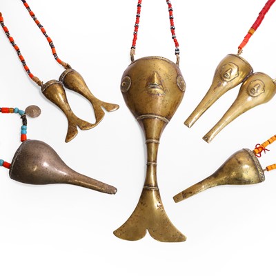 Lot 149 - Five Naga chank and fishtail pendant necklaces