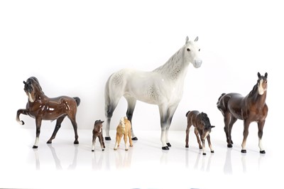 Lot 104 - A collection of Beswick porcelain horses