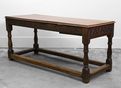 Lot 517 - An oak refectory table