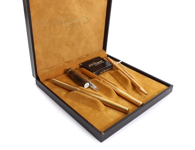 Lot 302 - A S.T. Dupont three piece pen and pencil set