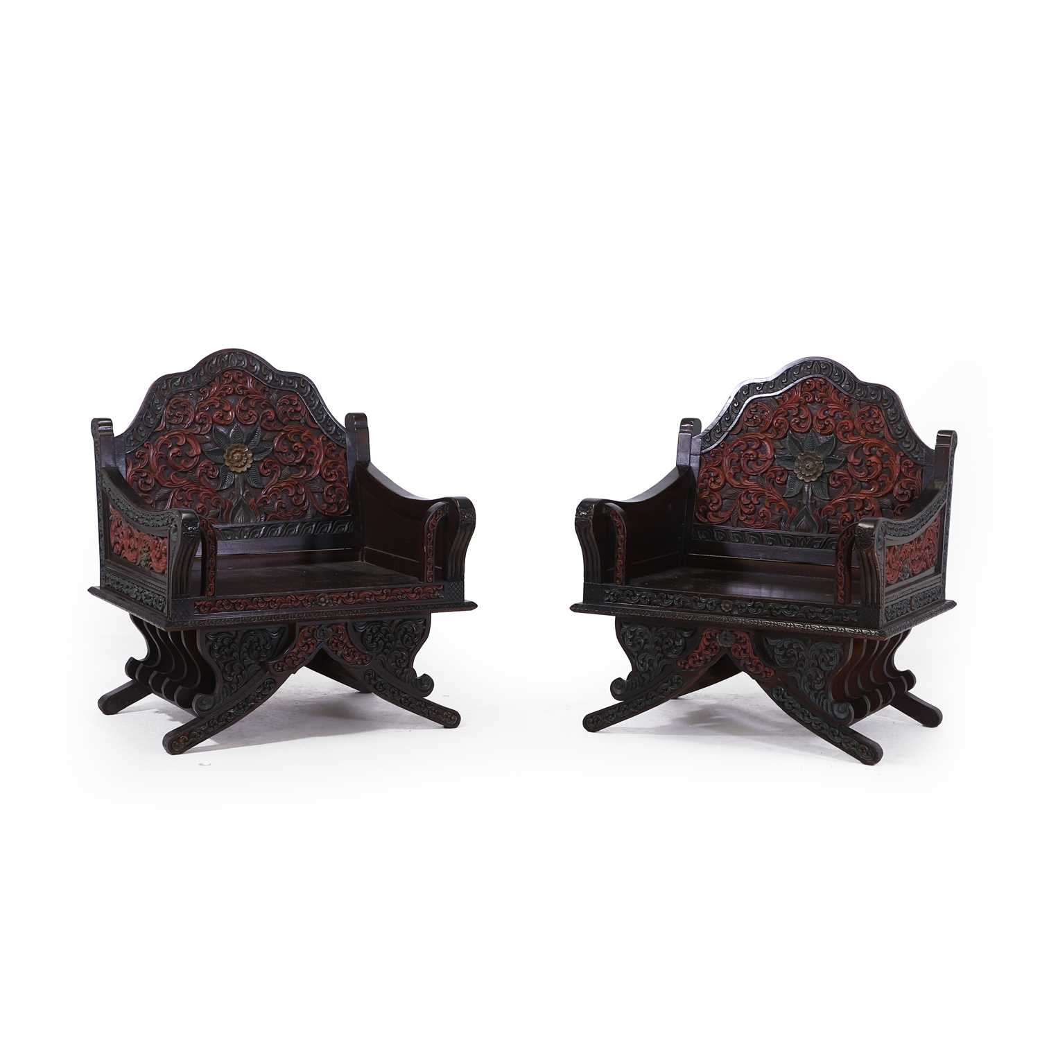 Lot 85 - A pair of carved hardwood howdah chairs