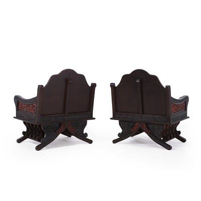Lot 85 - A pair of carved hardwood howdah chairs