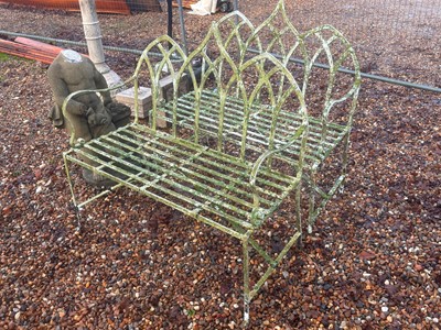 Lot 559 - Two painted wrought iron garden benches