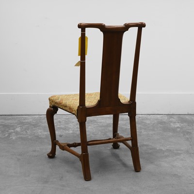 Lot 528 - A George II walnut yoke-back chair