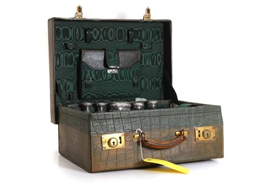 Lot 332 - A leather toilet case