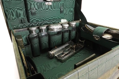 Lot 332 - A leather toilet case