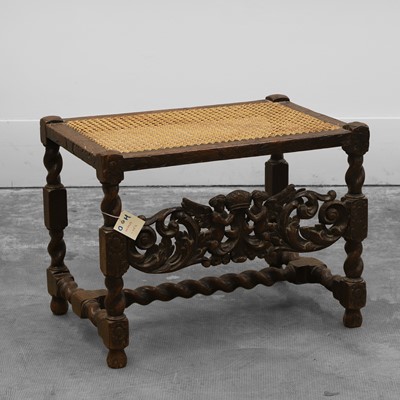 Lot 533 - A Caroleon style carved oak stool
