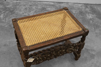 Lot 533 - A Caroleon style carved oak stool