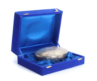 Lot 25 - A Middle Eastern silver trinket box of ovoid form