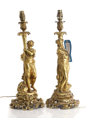 Lot 484 - A pair of gilt metal table lamps