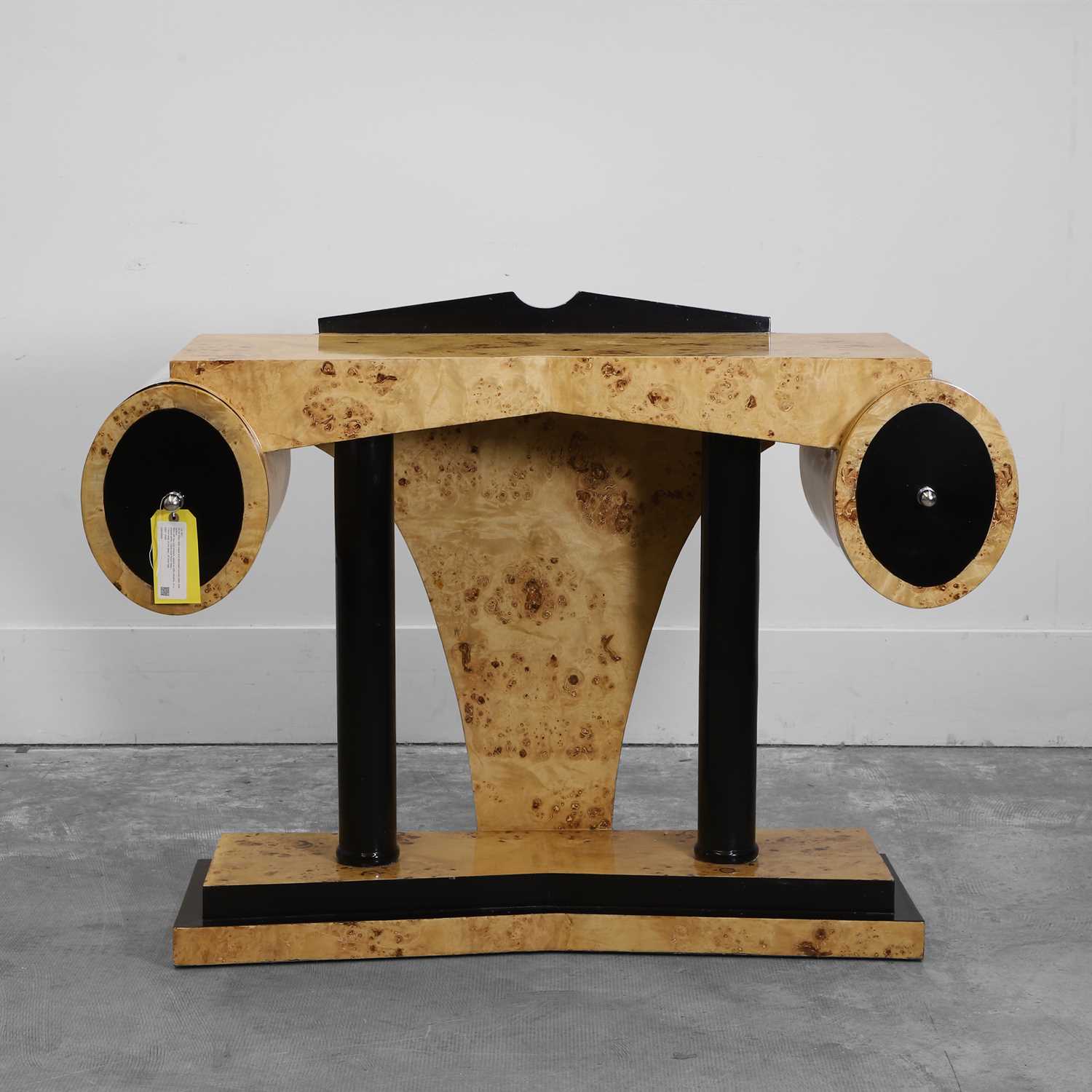 Lot 501 - An Art Deco style maple and ebonised console table