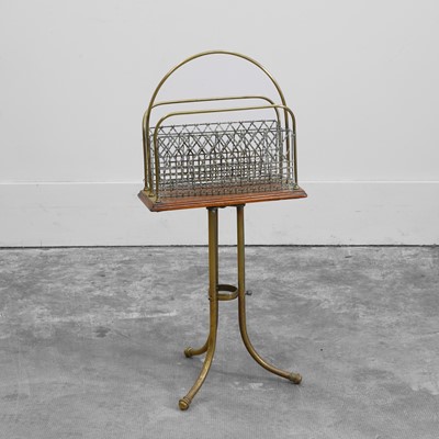 Lot 505 - An Edwardian brass and oak magazine rack