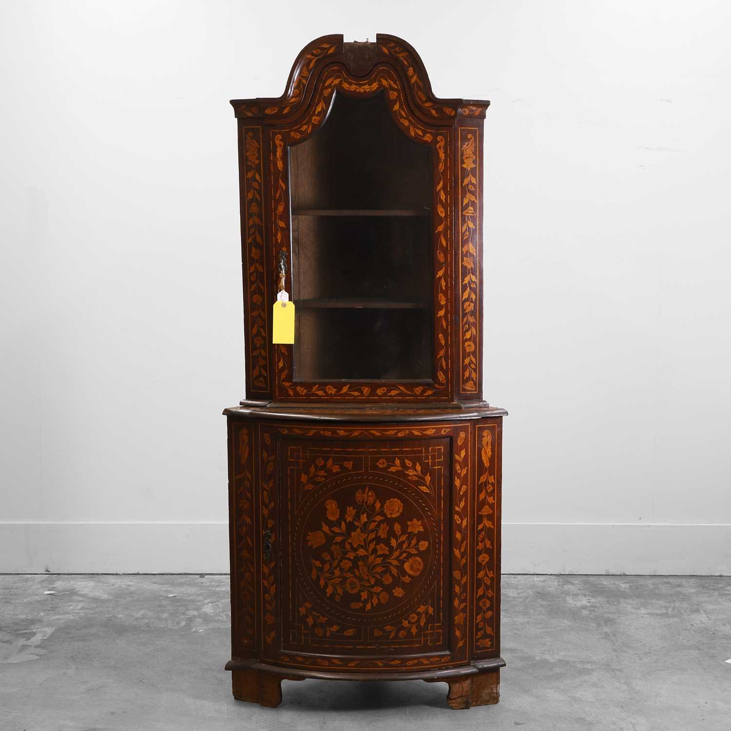 Lot 523 - A Dutch mahogany marquetry corner display cabinet