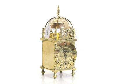 Lot 203 - A French brass lantern clock