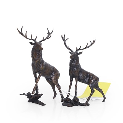 Lot 317 - A pair of bronze stag figures