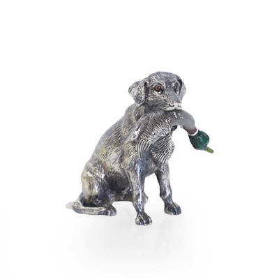 Lot 319 - A cast-metal sculpture of a dog with a mallard drake