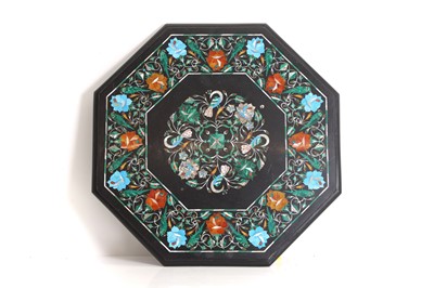 Lot 330 - An octagonal floral marble inlay top