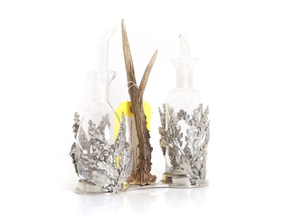 Lot 310A - A deer antler oil decanter holder