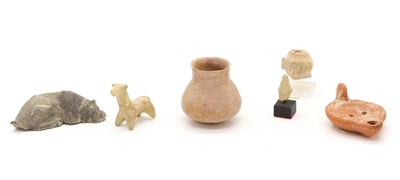 Lot 338 - A Roman terracotta oil lamp