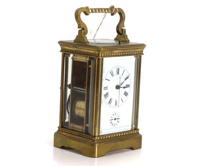 Lot 207 - A brass repeating carriage clock