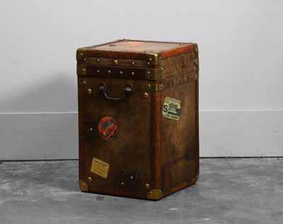 Lot 544 - A leather trunk