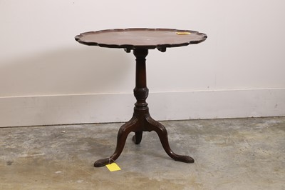 Lot 558 - A mahogany tilt-top occasional table