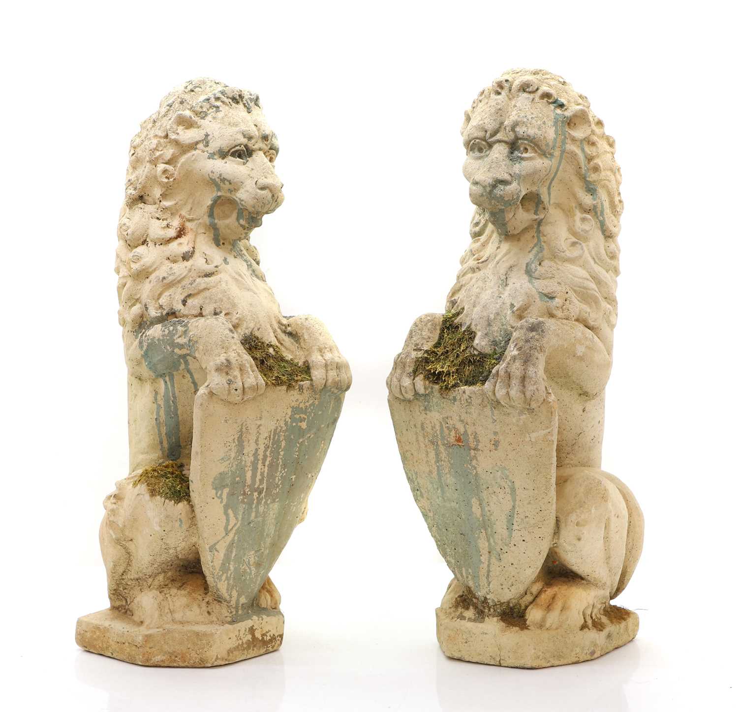 Lot 553 - A pair of reconstituted stone armorial lions