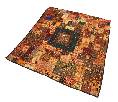 Lot 321 - A patchwork and embroidered textile bedspread