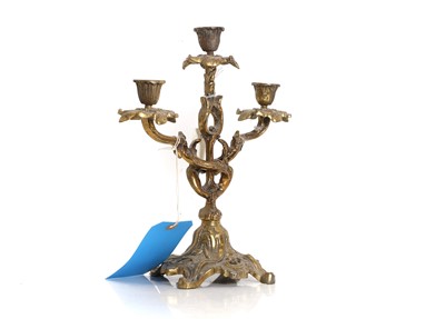 Lot 320 - An ormolu candelabra