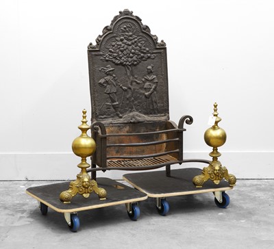 Lot 521A - A Continental cast iron fireback and wrought iron firegrate