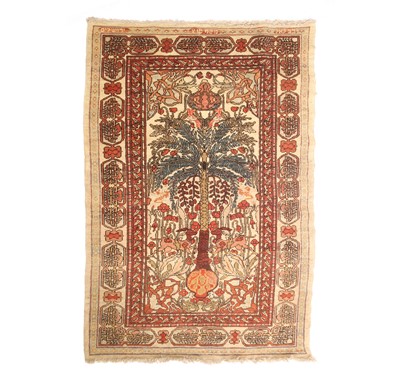 Lot 231 - A Bezalel School of Arts and Crafts style wool carpet