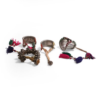 Lot 95 - Four reticulated silver bazuband armbands