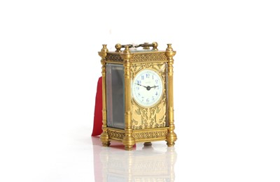 Lot 204 - A brass carriage timepiece
