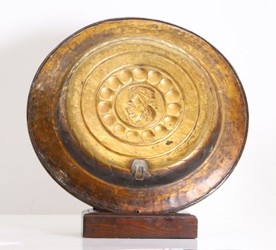 Lot 303 - A brass dish/ plaque with classical 'Cicero' medallion