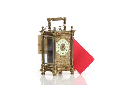 Lot 205 - A brass carriage timepiece