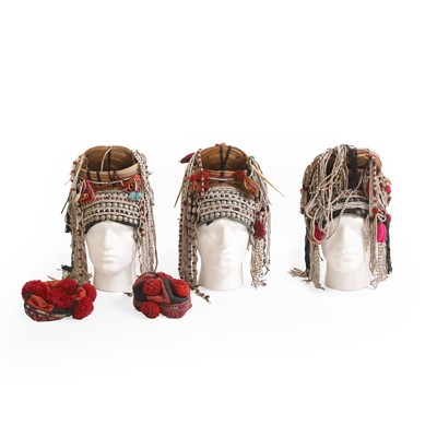 Lot 128 - A group of five tribal hats and headdresses