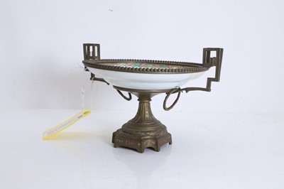 Lot 104 - A porcelain and gilt-metal tazza