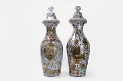 Lot A near pair of decalcomania glass vases and covers