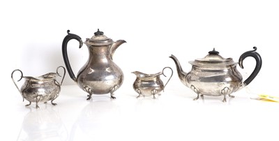 Lot 1 - A silver four part tea service