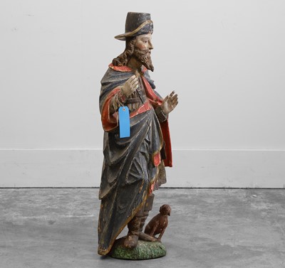 Lot 305 - A carved and polychrome-painted wooden figure of St Roche