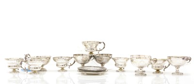 Lot 21 - A collection of Egyptian silver cups and saucers