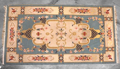 Lot 421 - An Aubusson style rug