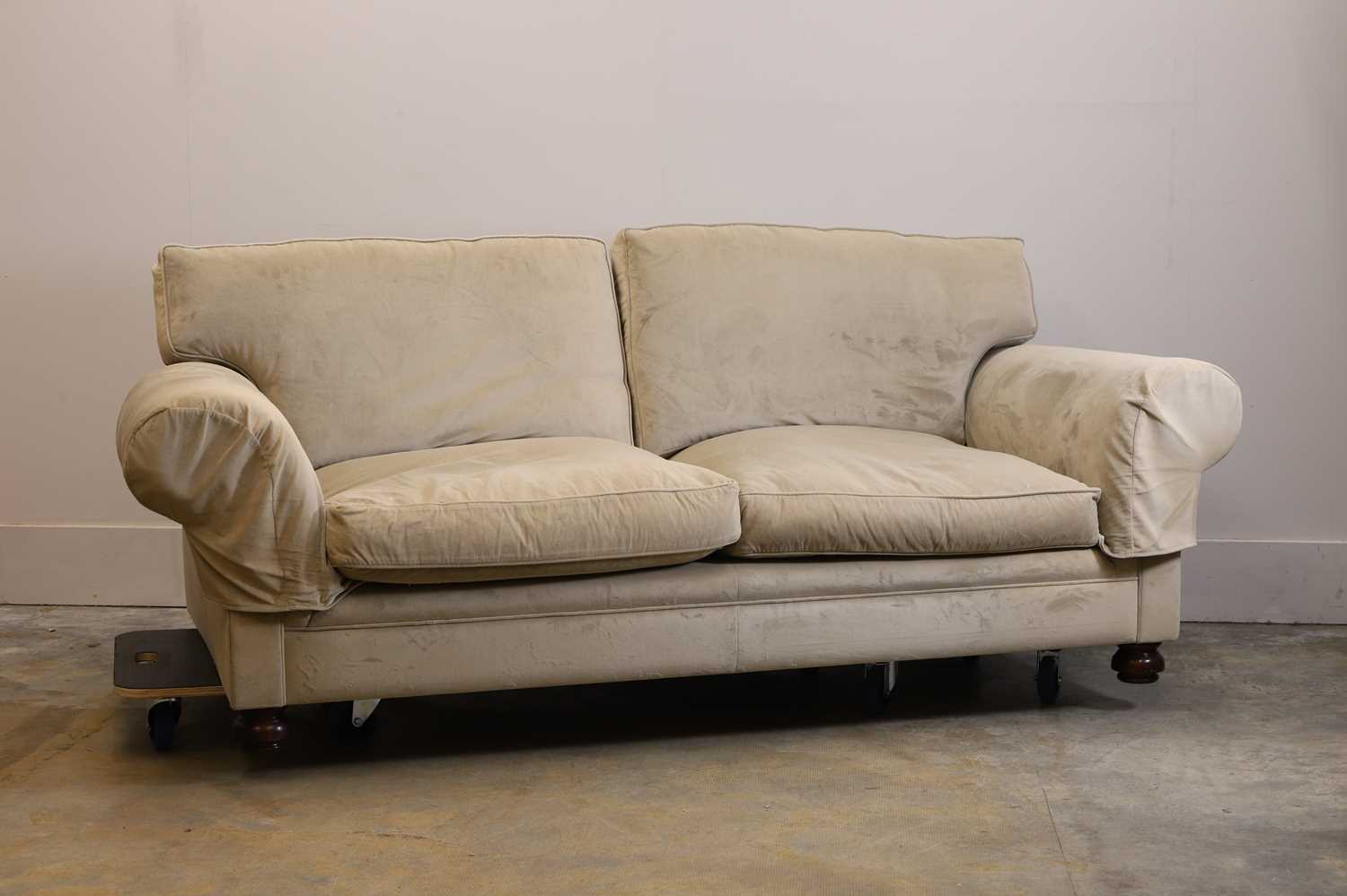 Lot 504 - A two seater sofa