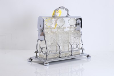 Lot 10 - A silver plated tantalus