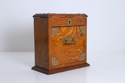 Lot 151 - An oak and brass mounted perfume casket