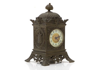 Lot 203 - A cast metal mantle clock