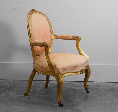 Lot 515 - An English giltwood open armchair