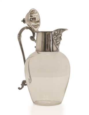 Lot 153 - A silvered mounted glass claret jug