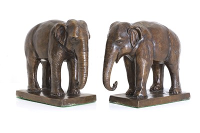 Lot 252 - A pair of bronze bookends